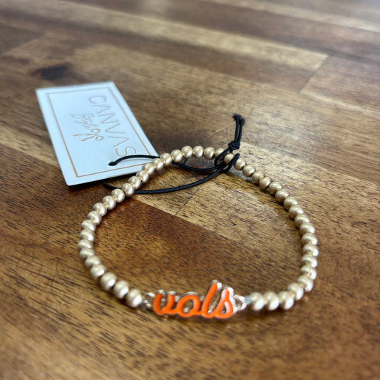 Beaded "T"/Vols